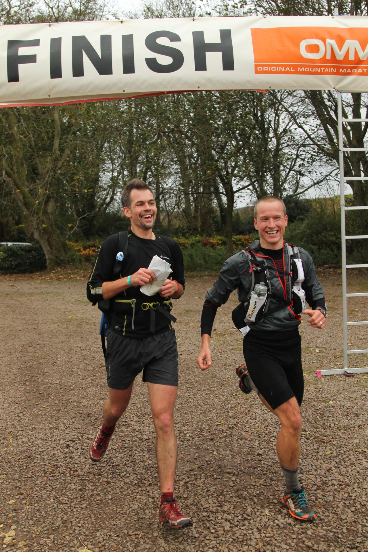Team Mountain Run happy to be crossing the finishing line after 2 days hard racing at the OMM 2014 - Cheviots
